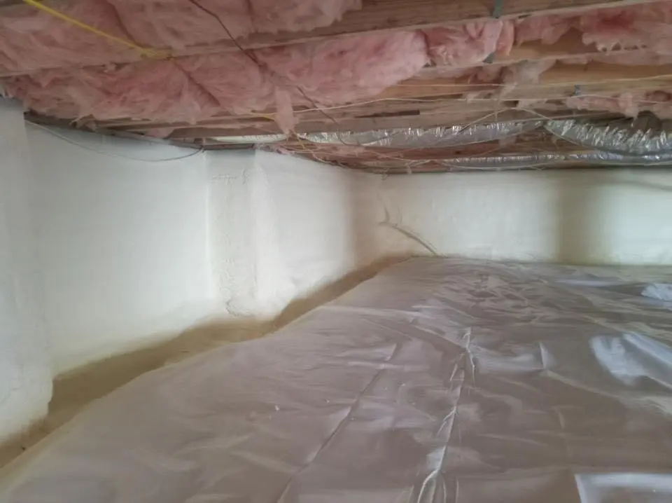 Crawl space encapsulation with closed-cell spray foam for Roof Waterproofing in Girard